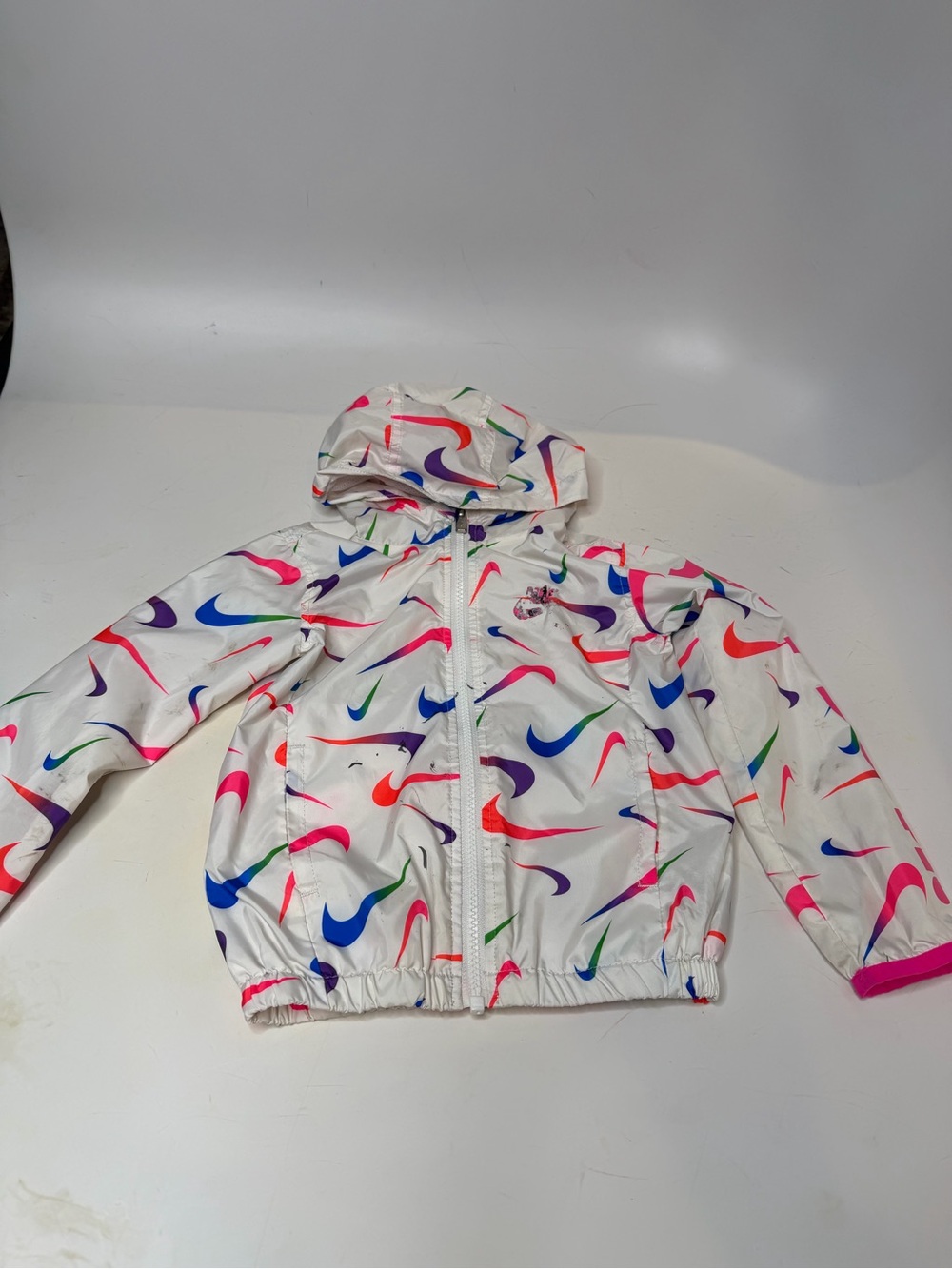 Nike White Hooded Rain Jacket with Multicolor Swoosh Print